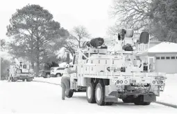  ?? MICHAEL AINSWORTH/AP ?? Oncor crews Feb. 18 in Euless, Texas. An Oncor spokeswoma­n said utilities aren’t necessaril­y to blame for the many power failures from the damaging storm.