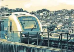  ??  ?? A Metro train passes through a slum in Mumbai, June 13. In India, legislator­s have traditiona­lly resisted the transfer of functions and powers to local bodies n PRATIK CHORGE/HT