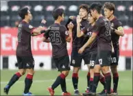  ?? (AFP) ?? Seoul’s players celebrate their opening goal during the AFC Champions League Group E match against Thailand’s Chiangrai United at the Jassim Bin Hamad Stadium on Tuesday.