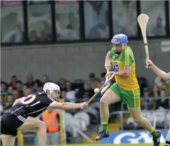  ??  ?? Gerard O’Kelly Lynch dispossess his Donegal counterpar­t.