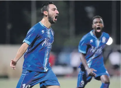  ??  ?? Christian Caruana of Sirens celebrates scoring the winning goal against Vittoriosa. Photo: Domenic Aquilina