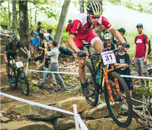  ??  ?? below Zandstra in the Canadian champion jersey gaps a stream at the Mont-sainteAnne World Cup