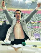  ?? ?? Lionheart: Pundit Gary Neville celebrates in the ITV match studio