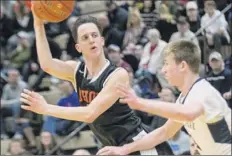  ?? Jim Franco / Special to the times union ?? mohonasen’s duncan tallman, left, the MVP of last year’s Class A tournament, scored 12 points against Averill Park.