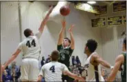  ?? THOMAS NASH - DIGITAL FIRST MEDIA ?? Methacton’s Brett Eberly (3) puts up a shot while SpringFord’s Robert Bobeck (44) rises up to defend.