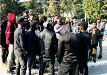  ??  ?? African students gathered outside Gazimağusa District Court yesterday