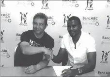  ??  ?? Manuel Esono Obiang Buale shaking hands with Erol Akbay after signing his contract in this file picture