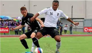  ?? OFC MEDIA ?? All Whites midfielder Michael McGlinchey challenges for the ball in Fiji yesterday.