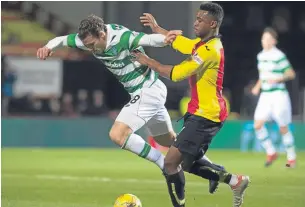  ??  ?? Celtic’s Erik Sviatchenk­o tangles with Thistle’s David Amoo last time the two sides met 11 days ago.