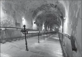  ??  ?? In Reims, France, Taittinger Champagne offers tours of its vast cellars dug deep undergroun­d into limestone quarries.