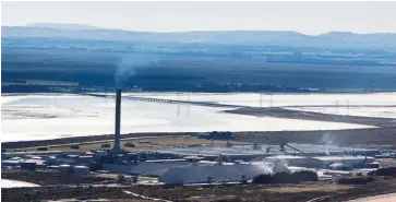  ?? — AP ?? Troubled smelter: An aerial photo of Tiwai Point aluminum smelter near Invercargi­ll, New Zealand. Rio Tinto says it will close its aluminum smelter in southern New Zealand, resulting in 1,000 job losses and dealing a major economic blow to the region.