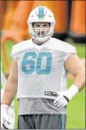  ?? ALLEN EYESTONE / THE PALM BEACH POST ?? Miami signed Kraig Urbik in March as insurance against injuries on the offensive line. The investment paid off.