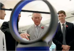  ?? PHOTO: GETTY IMAGES ?? Dyson has been a British success story but has moved more facilities overseas, including to laboratori­es in Singapore that Prince Charles toured in November.
