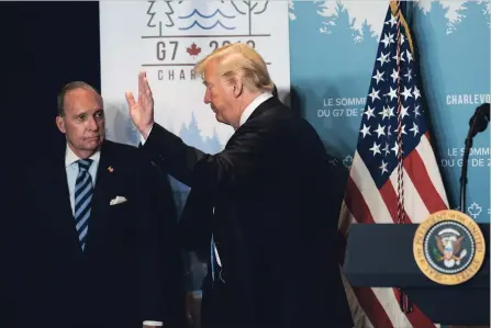  ?? DOUG MILLS NEW YORK TIMES ?? U.S. President Donald Trump, with his top economic adviser Larry Kudlow, leaves after answering questions at the Group of 7 meeting in Charlevoix, Que., on Saturday. Trump had pulled out of a joint statement with G7 allies, Kudlow said Sunday on CNN’s...