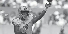  ?? JIM RASSOL/THE PALM BEACH POST ?? Tua Tagovailoa drops back to pass against the Patriots during the second half at Hard Rock Stadium on Sunday.