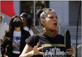 ?? RICHARD VOGEL — THE ASSOCIATED PRESS FILE ?? Melina Abdullah speaks during a Black Lives Matter protest at the Hall of Justice in downtown Los Angeles. Abdullah is a leading Black Lives Matter activist in Los Angeles.