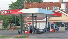  ?? ANGELA PETERSON / MILWAUKEE JOURNAL SENTINEL ?? Curtis Fisher’s brother, Robert DaQuan Taylor, was killed in a shootout at this gas station at North 27th Street and West Capitol Drive on Aug. 9, 2018.