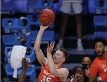  ?? AJ MAST - THE ASSOCIATED PRESS ?? Syracuse guard Buddy Boeheim (35) shoots over San Diego State guard Lamont Butler (5) during the first half of a college basketball game in the first round of the NCAA tournament at Hinkle Fieldhouse in Indianapol­is, Friday, March 19, 2021.