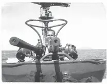  ?? Courtesy photo ?? Don MacKenzie manning a twin .50 cal machine gun.