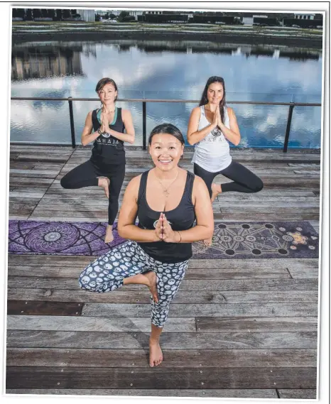  ?? Picture: JERAD WILLIAMS ?? Sarah Breakspear, Judes Yang and Ashleigh Green have reason to celebrate after Ms Yang’s businesses, State of Sahaja Yoga Mats and Yoga Studio, were awarded B Corporatio­n status.