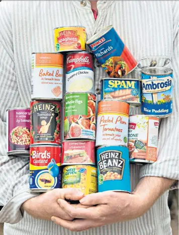  ??  ?? Stocking up: tinned food staples are invaluable in emergencie­s and can be a good source of nutrients, says Jack Monroe, left