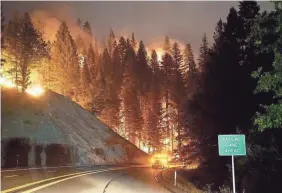  ?? TREVOR HUGHES/USA TODAY ?? The Carr Fire in Redding, Calif., has destroyed almost 900 homes. At least six people have died, including two firefighte­rs.