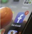  ?? aP FIle ?? PROBLEM SOLVED: Widespread crashes of popular apps running on the iPhone’s iOS operating system were attributed by Facebook to a problem with a bug in its software developmen­t kit, or SDK, a tool developers use to integrate their apps with Facebook.