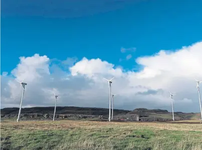  ??  ?? GREEN TECHNOLOGY: The six turbines which have combined with solar to provide more than 90% of Canna’s power