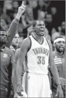  ?? The Associated Press ?? Oklahoma City’s Kevin Durant leads the cheers against the San Antonio Spurs during the first half of Game 3 in their NBA Western Conference finals on Thursday in Oklahoma City.