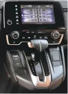  ??  ?? Honda has gone back to having a real volume control knob for the CR-V’s entertainm­ent system, which is compatible with Apple CarPlay and Android Auto.