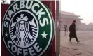  ?? ?? A Starbucks branch in Forbidden City, Beijing, China. The retailer remains the largest branded coffee chain in east Asia. Photograph: Guang Niu/Reuters