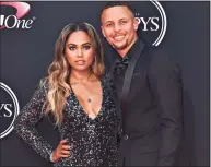  ?? Axelle / Bauer-Griffin / FilmMagic ?? NBA player Steph Curry, right, and author Ayesha Curry arrive at the ESPYS at Microsoft Theater on July 12, 2017 in Los Angeles.