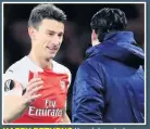  ??  ?? Koscielny shakes hands with Emery after his comeback