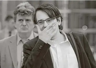  ?? Peter Foley / Bloomberg ?? Martin Shkreli, former CEO of Turing Pharmaceut­icals, leaves federal court on Wednesday in Brooklyn. “I think the world blames me for almost everything,” he told reporters in a courthouse overflow room.