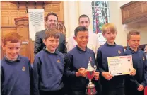  ??  ?? Awards The 1st/3rd Renfrew Company junior section with their battalion trophy presented by Craig Martin from sponsors Glasgow Airport