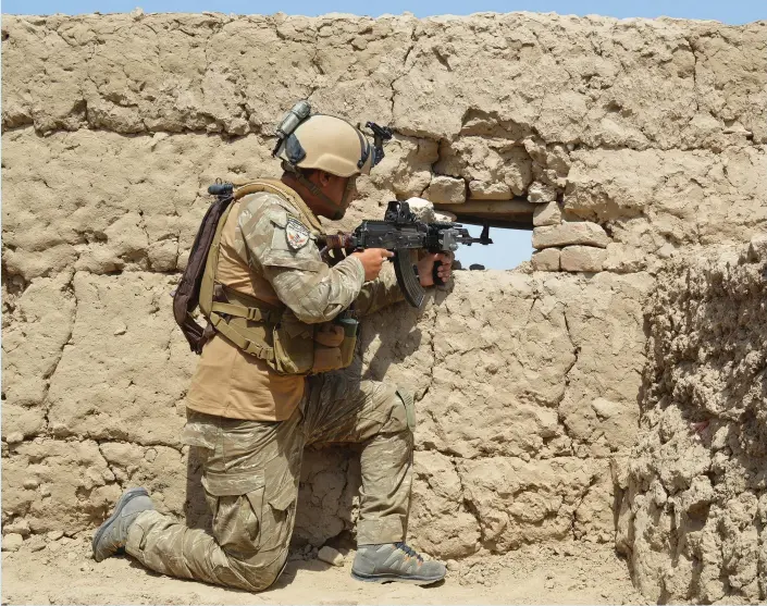  ?? (Reuters) ?? AN AFGHAN soldier takes aim at the Taliban.