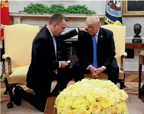  ?? AP ?? President Donald Trump prays with American pastor Andrew Brunson in the Oval Office of the White House yesterday.