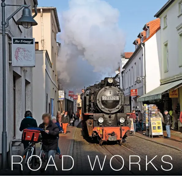  ?? ALL: TONY STREETER ?? Keep clear! Bell ringing, 2009-built No. 99.2324 and its train advance up the tightest section of Bad Doberan’s Mollistras­se on October 29 2015. The road is now named after the railway – and in summer this sight is repeated up to 11 times a day… Faces have been pixellated to comply with German privacy law.