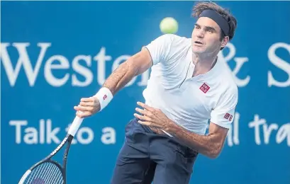  ?? JOHN MINCHILLO THE ASSOCIATED PRESS ?? Roger Federer ended weeks of speculatio­n this summer when he stepped onto the court wearing a Uniqlo shirt.