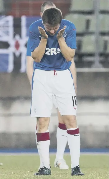  ??  ?? 0 Rangers’ Jordan Rossiter hides his head in his hands after the second goal by Progres Niederkorn.