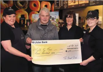  ??  ?? Staff from the ‘Bagel Bar’ in Gorey Shopping Centre raised €400 for the charity Talk to Tom. Tara Murray, Talk to Tom CEO Ray Cullen, manager Carol Mc Evoy and Lisa Redmond.