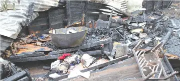  ?? ?? The inferno razed household property such as sofas, beds, fridges, electricit­y and gas stoves