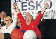  ?? [AP PHOTO] ?? Republican U.S. Congressio­nal candidate Debbie Lesko, right, celebrates her win with former Arizona Gov. Jan Brewer at her home, Tuesday in Peoria, Ariz.