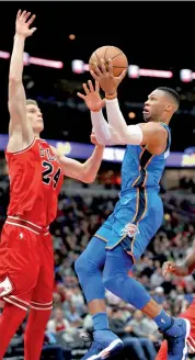  ??  ?? Oklahoma City Thunders’ Russell Westbrook goes up to shoot against Chicago Bulls’ Lauri Markkanen in their NBA game in Chicago on Saturday . — AP