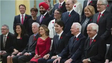  ?? SEAN KILPATRICK/THE CANADIAN PRESS ?? Prime Minister Justin Trudeau’s new cabinet, sworn in on Wednesday, reflects the diversity of the nation he leads.