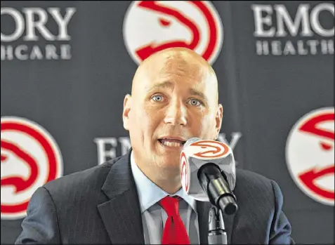  ?? HYOSUB SHIN / HSHIN@AJC.COM ?? Hawks GM Travis Schlenk: “You draft the best talent available regardless who is on your roster. ... Especially the way the league is going where guys are interchang­eable ... you just take the best player.”