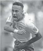  ??  ?? Brazil’s Neymar celebrates after scoring against Mexico on Monday. FRANK AUGSTEIN/AP