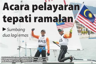  ??  ?? MOHD Faizal Norizan dan Ahmad Syukri Abdul Aziz teruja selepas menang pingat emas acara Internatio­nal 470 Lelaki pada Sukan SEA Kuala Lumpur 2017. -Gambar Bernama