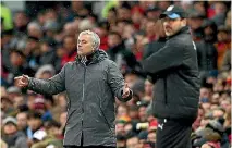  ?? PHOTO: GETTY IMAGES ?? Rival managers Jose Mourinho (Manchester United, left) and Huddersfie­ld Town’s David Wanger expressed reservatio­ns about the VAR system.