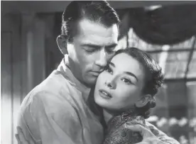  ?? Foto: Getty Images / Hulton Archive / ?? 1953: velika uspešnica Rimske počitnice, Audrey Hepburn z Gregoryjem Peckom